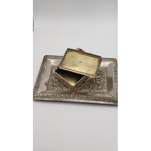 201 - A white metal pin dish having a floral embossed detail and a white metal trinket box A/F, 191.5g
Loc... 