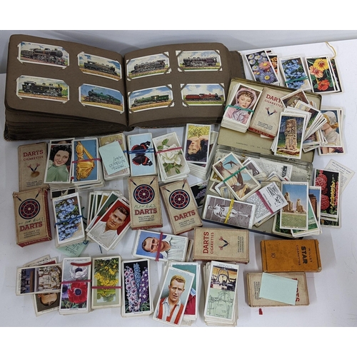 202 - A collection of cigarette cards to include an album containing mainly complete sets to include Airme... 