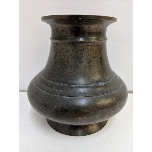 205 - A Chinese brass Lota pot with a flared rim and of bulbous form, on a raised rim
Location:R2.5