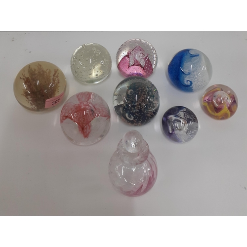 208 - A group of 8 glass paperweights to include Caithness 'Tidal wave' together with a decorative glass s... 