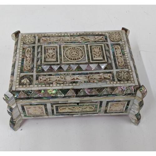 111 - An oriental inlaid mother of pearl box A/F having pierced, floral inlaid detail, Location:R2.4