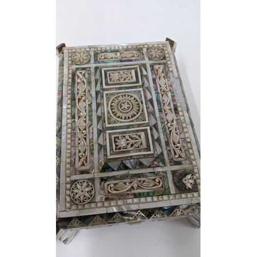 111 - An oriental inlaid mother of pearl box A/F having pierced, floral inlaid detail, Location:R2.4