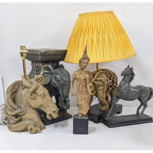 112 - A mixed lot to include a cast metal bronze coloured Thai figurine, a resin pierced elephant lamp, A/... 