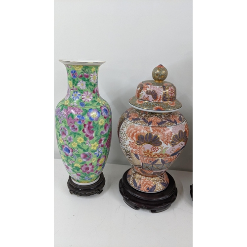 116 - Four oriental vases to include a Chinese famille rose vase and others, Location:7.3