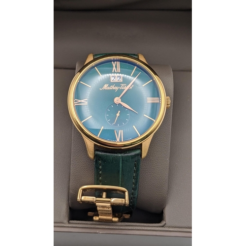 141 - A Mathey Tissot quartz stainless steel gents wristwatch with a green face, a mixed Roman and stick d... 