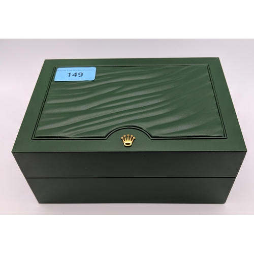 149 - A Rolex green leather wristwatch box and out cardboard box, reference number 31.00.04
Location:A4B