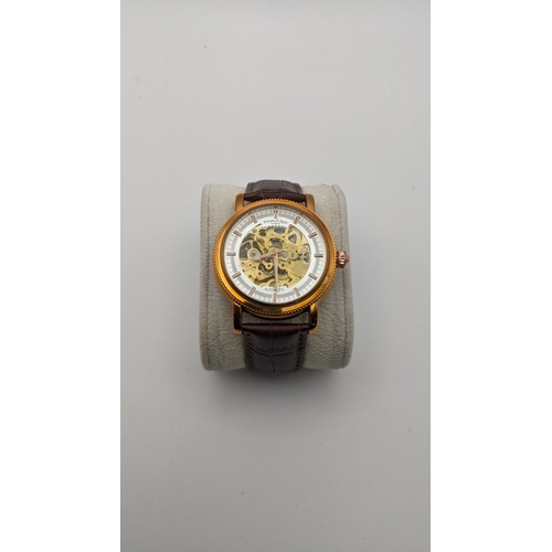 160 - A Swan and Edgar Skeleton automatic gents wrist watch on a brown leather strap
Location:CAB6