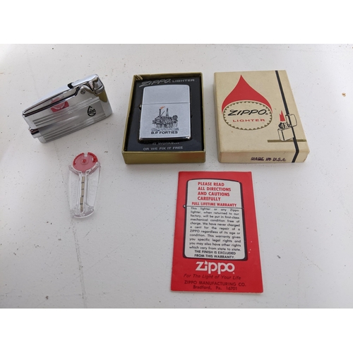 167 - A boxed B P Forties Zippo lighter, and a Ronson lighter Location:CAB1