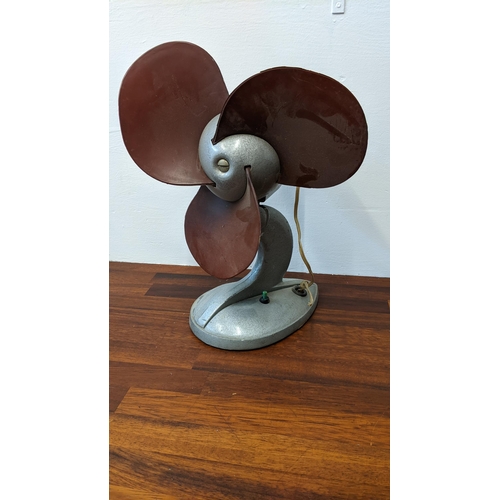 263 - A vintage metal and rubble Sofly fan working, needs wiring
Location: G