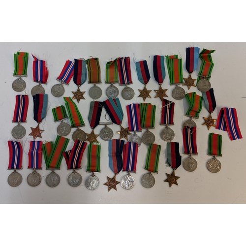 292 - WWII medals to include Defence, British war and Stars, Location:STAIRS