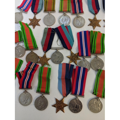 292 - WWII medals to include Defence, British war and Stars, Location:STAIRS