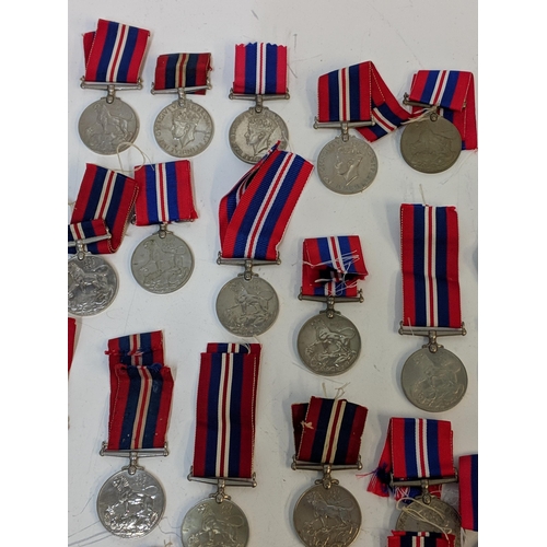 296 - Forty four WWII British service medals, (five without ribbons), Location:STAIRS