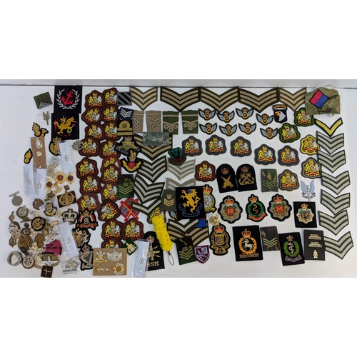 299 - Cloth military badges and cap badges to include Royal Army Veterinarian Corps, Royal Hussairs, RAF R... 