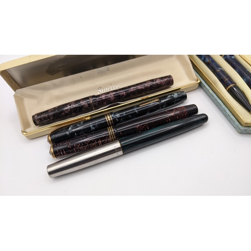 54 - Six mixed pens to include a Conway Stewart fountain pen with 14k gold nib
Location:T