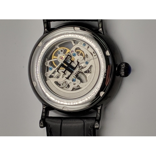 68 - A Thomas Earnshaw gents automatic skeleton wrist watch, on a black leather strap
Location:CAB6