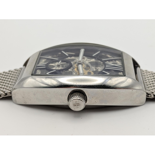 70 - A Thomas Earnshaw automatic gents skeleton wrist watch on a mesh strap
Location:CAB6