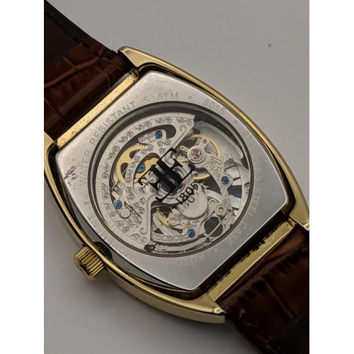 71 - A Thomas Earnshaw Holborn automatic gents wrist watch on a brown leather strap
Location:CAB6