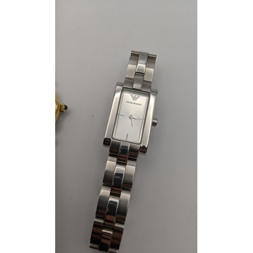 74 - A ladies Emporio Armani quartz stainless steel wristwatch, together with a Raymond Weil Geneve ladie... 