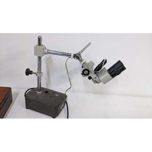 76 - A Meiji techno watchmakers microscope on a stand
Location:LAB