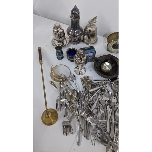 96 - A mixed lot to include loose cutlery, travel clock, eggcup with chick's head cover, and other items ... 