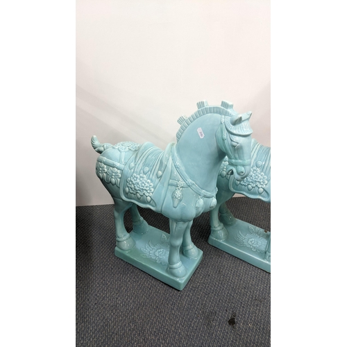 122 - A pair of turquoise ceramic horse sculptures, 54cm h Location:A1F