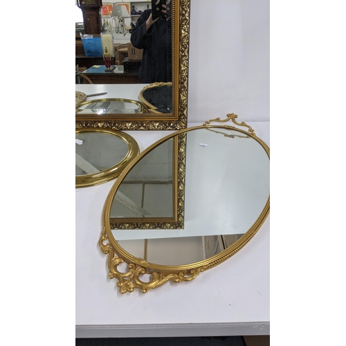 220 - Mixed guilt framed mirrors, together with a wall hanging crest shield, Location:RWB