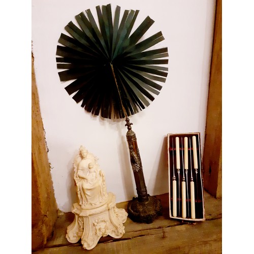 88 - An early Victorian gothic revival face screen having a base metal stand with folding green silk fan ... 