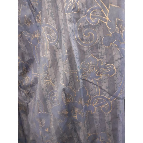 134 - A pair of 'Indienne' from the Broderie Collection by Today extra long blue full length curtains, hav... 