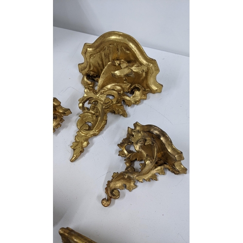 101 - Mid 20th century gilt wood carved, ornate wall brackets to include four various sizes, Location:A4B