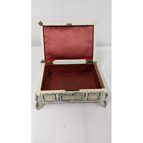 111 - An oriental inlaid mother of pearl box A/F having pierced, floral inlaid detail, Location:R2.4