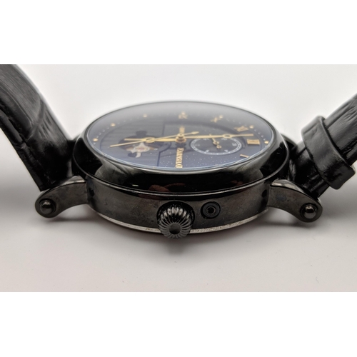 136 - An Earnshaw, automatic gents stainless steel wristwatch with a black face with a part Roman dial, wi... 