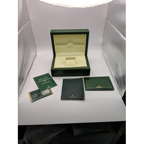 149 - A Rolex green leather wristwatch box and out cardboard box, reference number 31.00.04
Location:A4B