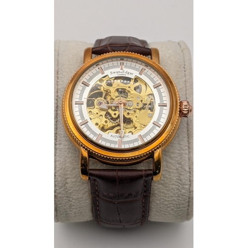 160 - A Swan and Edgar Skeleton automatic gents wrist watch on a brown leather strap
Location:CAB6