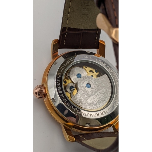 160 - A Swan and Edgar Skeleton automatic gents wrist watch on a brown leather strap
Location:CAB6