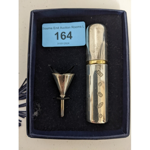 164 - A silver cased atomiser of cylinder form with funnel, Birmingham 2003, a small silver scent bottle w... 