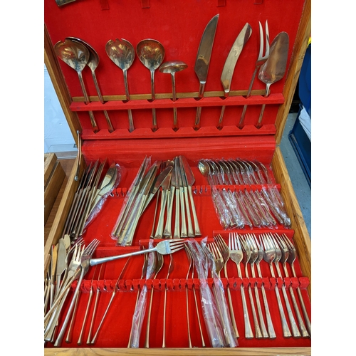 185 - An exquisite nickel bronze 12 piece cutlery set, in a wooden case
Location:LWM