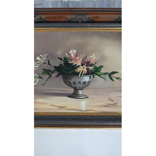 217 - Mixed oil paintings to include three still life oil on board paintings depicting flowers in a vase, ... 