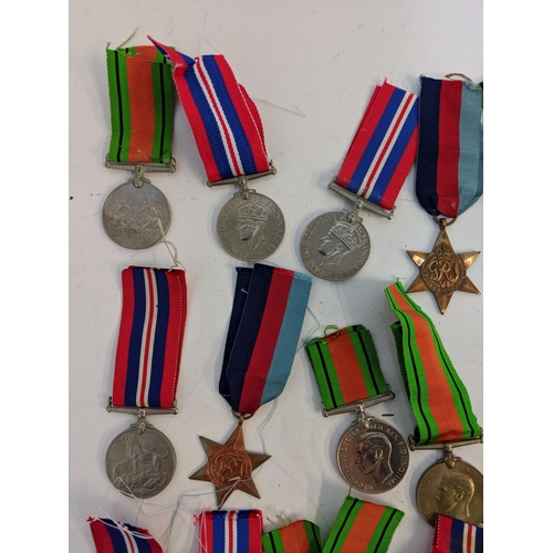 292 - WWII medals to include Defence, British war and Stars, Location:STAIRS