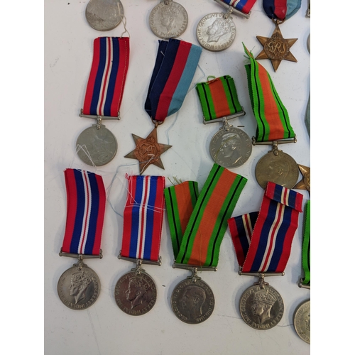 292 - WWII medals to include Defence, British war and Stars, Location:STAIRS