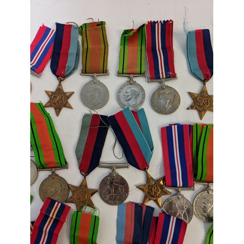 292 - WWII medals to include Defence, British war and Stars, Location:STAIRS