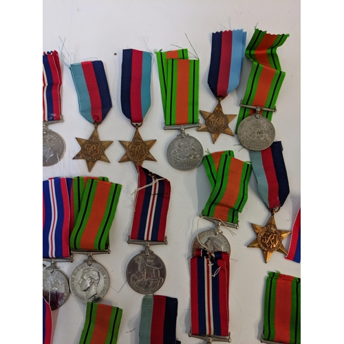 292 - WWII medals to include Defence, British war and Stars, Location:STAIRS