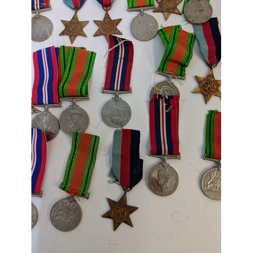 292 - WWII medals to include Defence, British war and Stars, Location:STAIRS