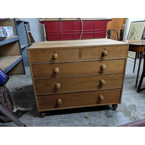 311 - A pine chest of drawers, two short over three graduating long drawers raised on tulip seat
Location:... 