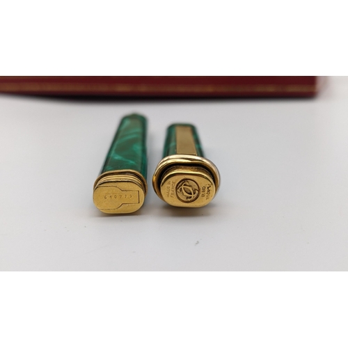 43 - A Cartier malachite lacquer ballpoint pen, with box, numbered 610779
Location:CAB7