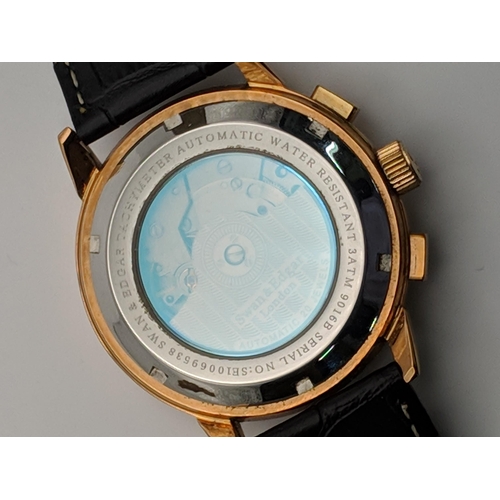 66 - A Swan and Edgar 20 jewels automatic wrist watch on a black leather strap
Location:CAB6