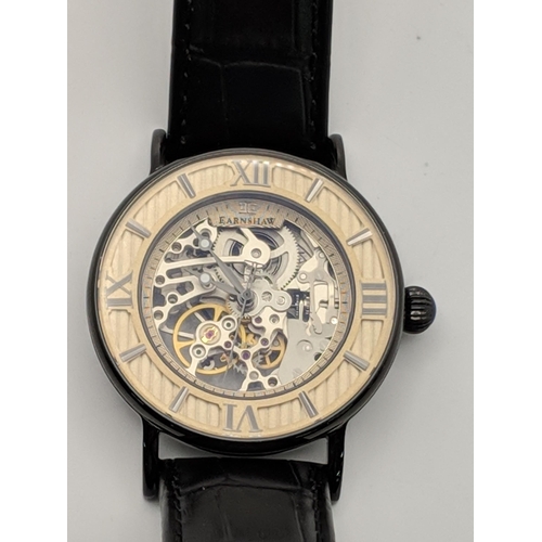 68 - A Thomas Earnshaw gents automatic skeleton wrist watch, on a black leather strap
Location:CAB6