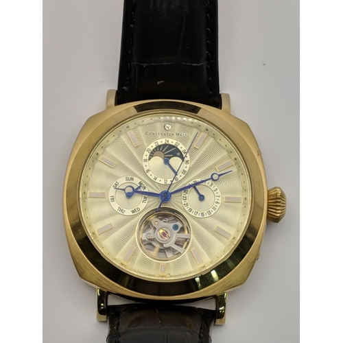 69 - A Constantin Weisz automatic open heart wrist watch, on a black leather strap 
Location:CAB6