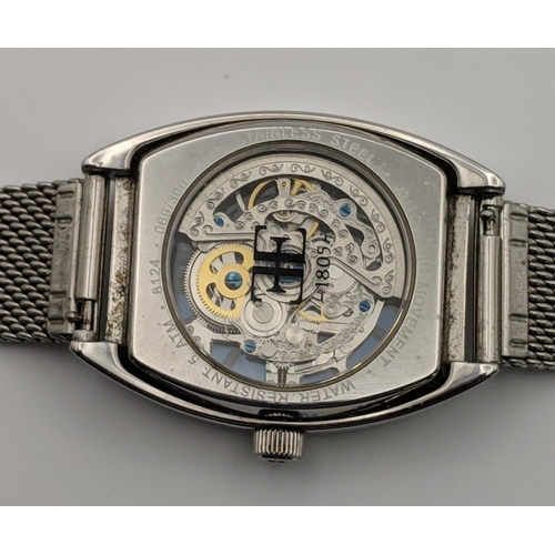 70 - A Thomas Earnshaw automatic gents skeleton wrist watch on a mesh strap
Location:CAB6