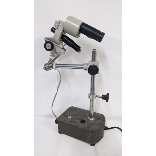 76 - A Meiji techno watchmakers microscope on a stand
Location:LAB