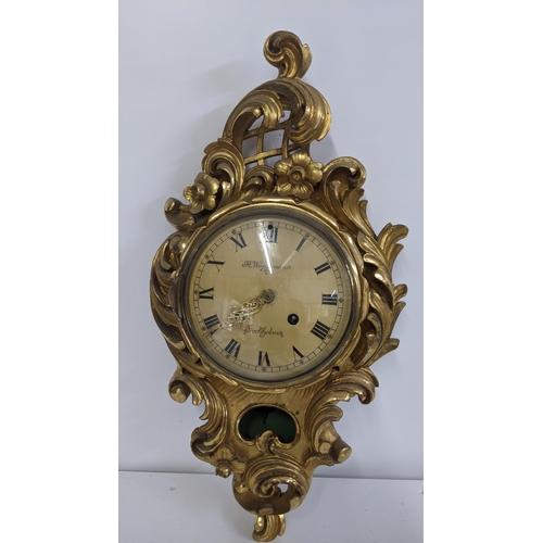 83 - A mid 20th century Swedish gilt carved 8 day wall clock, the dial signed Wergeman, 58.5h x 30W
Locat... 